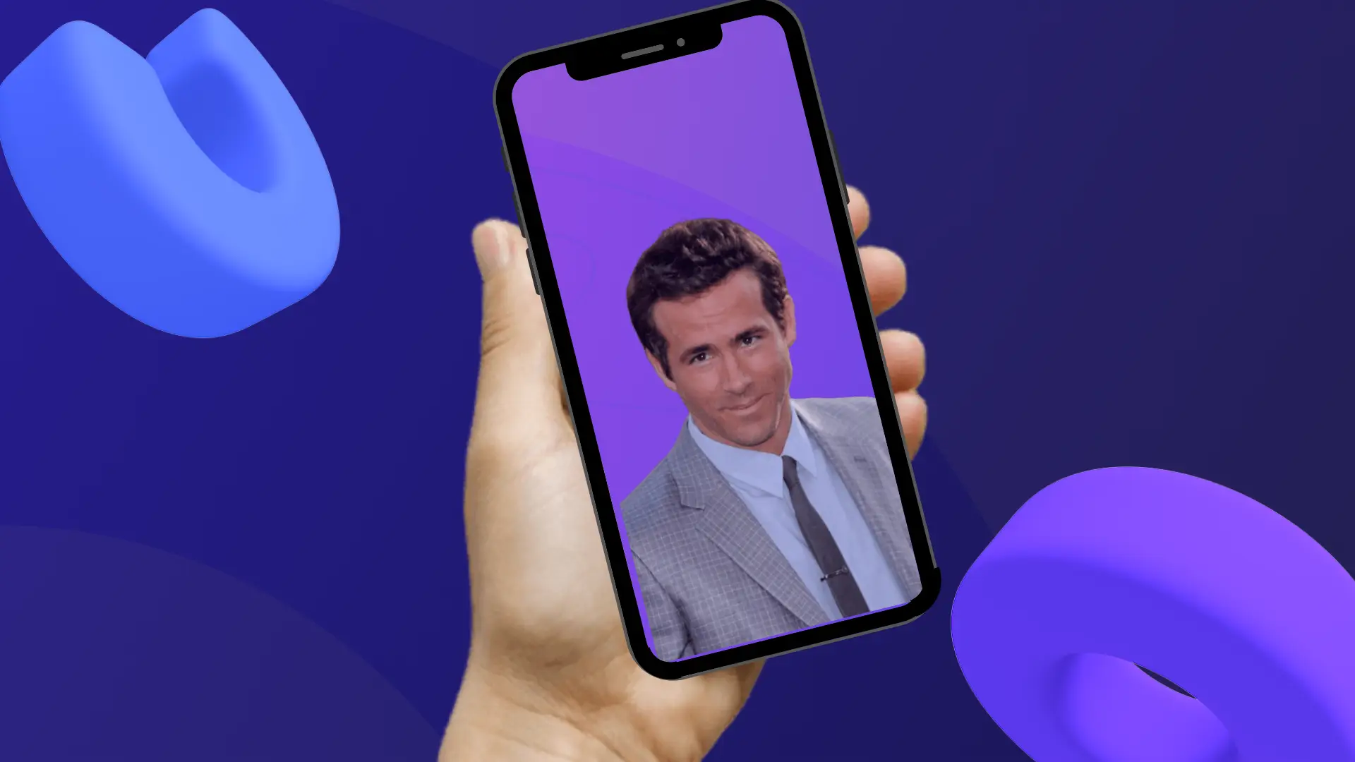 Celebrity Ryan Reynolds image on a phone using green screen with Clipchamp brand