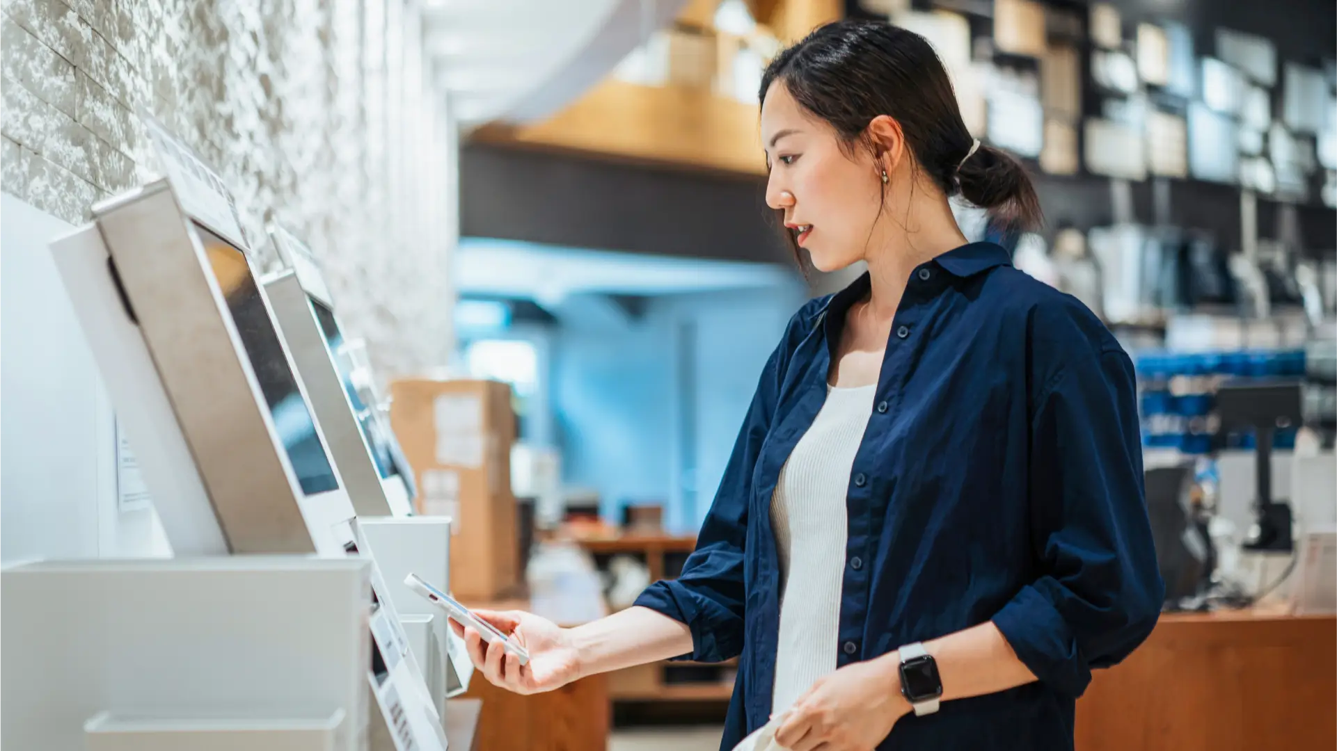 A woman paying for an item.