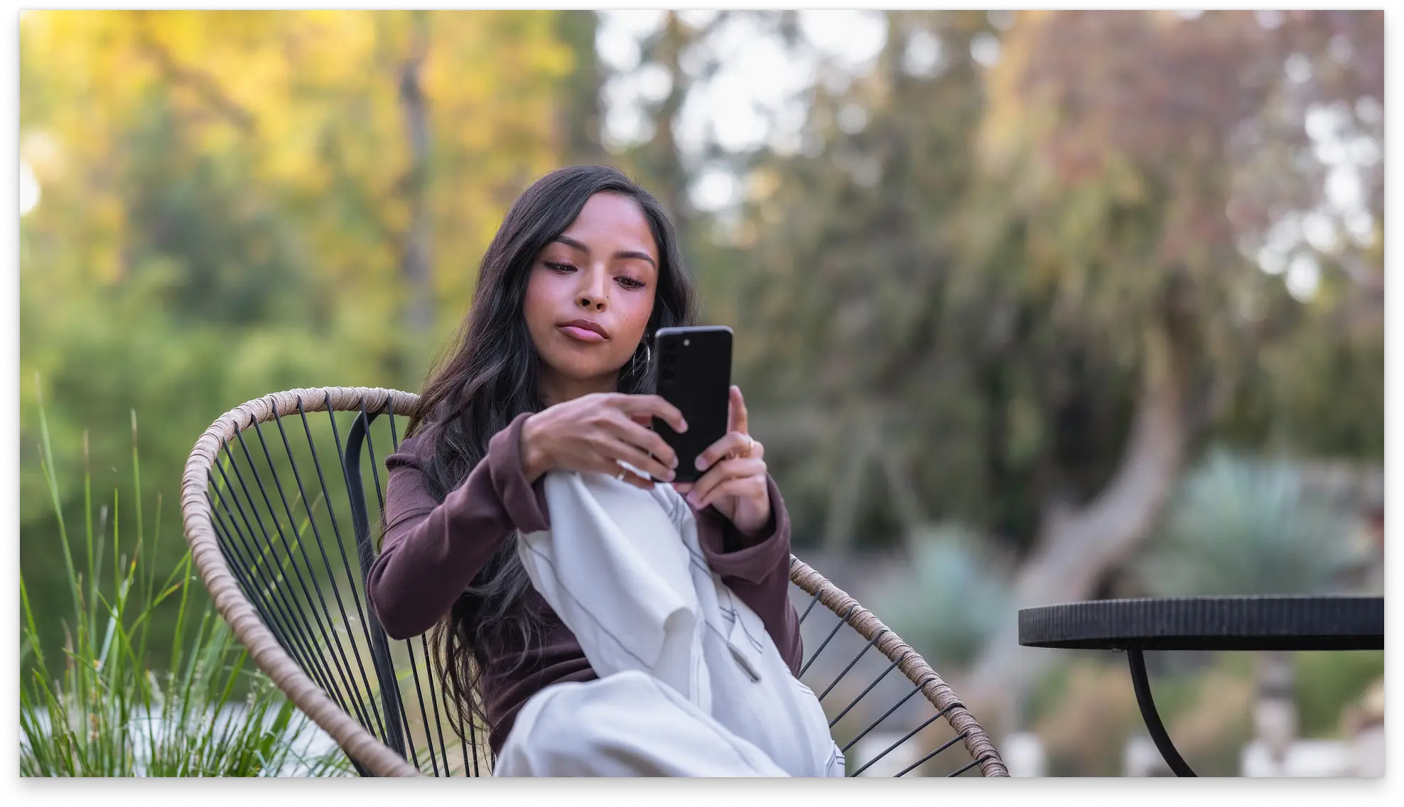 A woman on her mobile phone outdoors