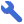 A blue icon of a spanner.